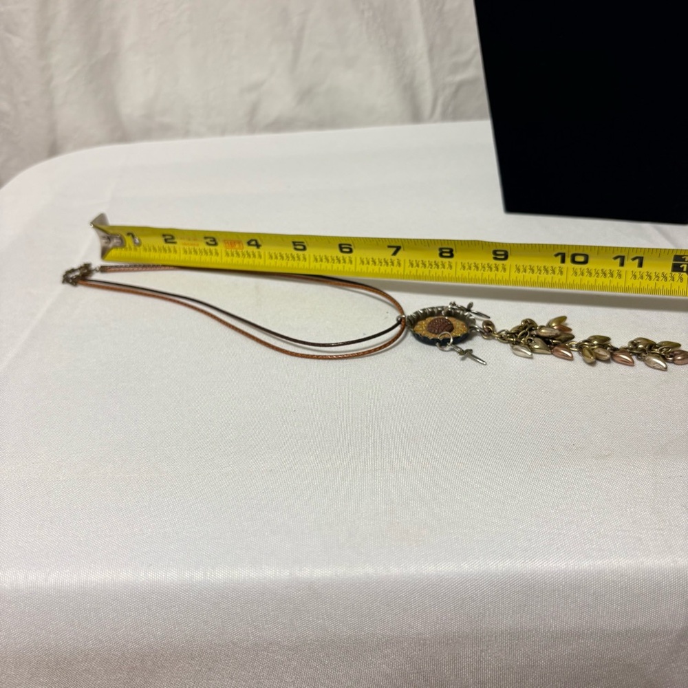 Handmade metal and leather sunflower necklace with multiple dangling charms - Picture 5 of 5